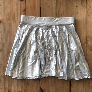 Silver mini circle skirt with elastic waistband.